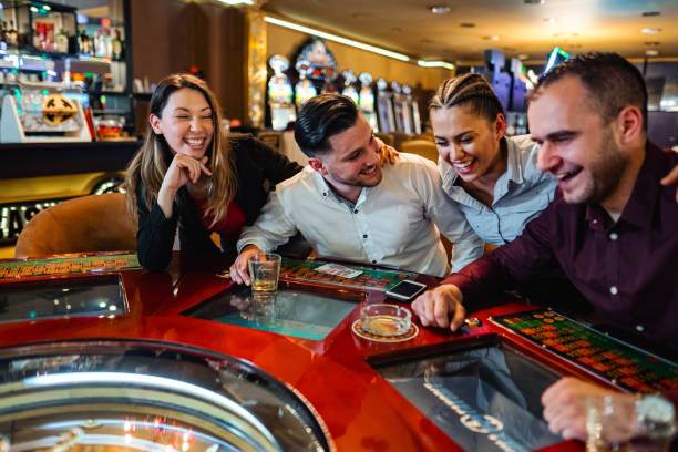 Game lobby showing multiple live-dealer table options with player counts and current limits